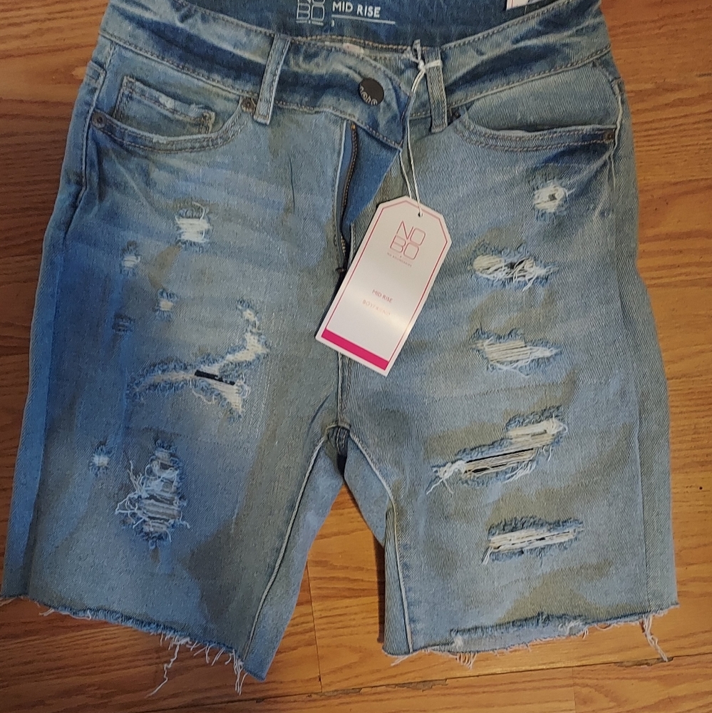 Never worn distressed bermuda shorts